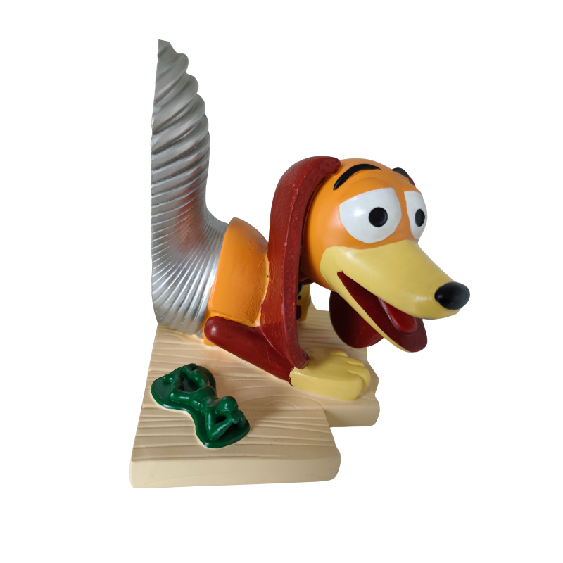 Vista lateral del sujetalibros Slinky de Toy Story en resina
